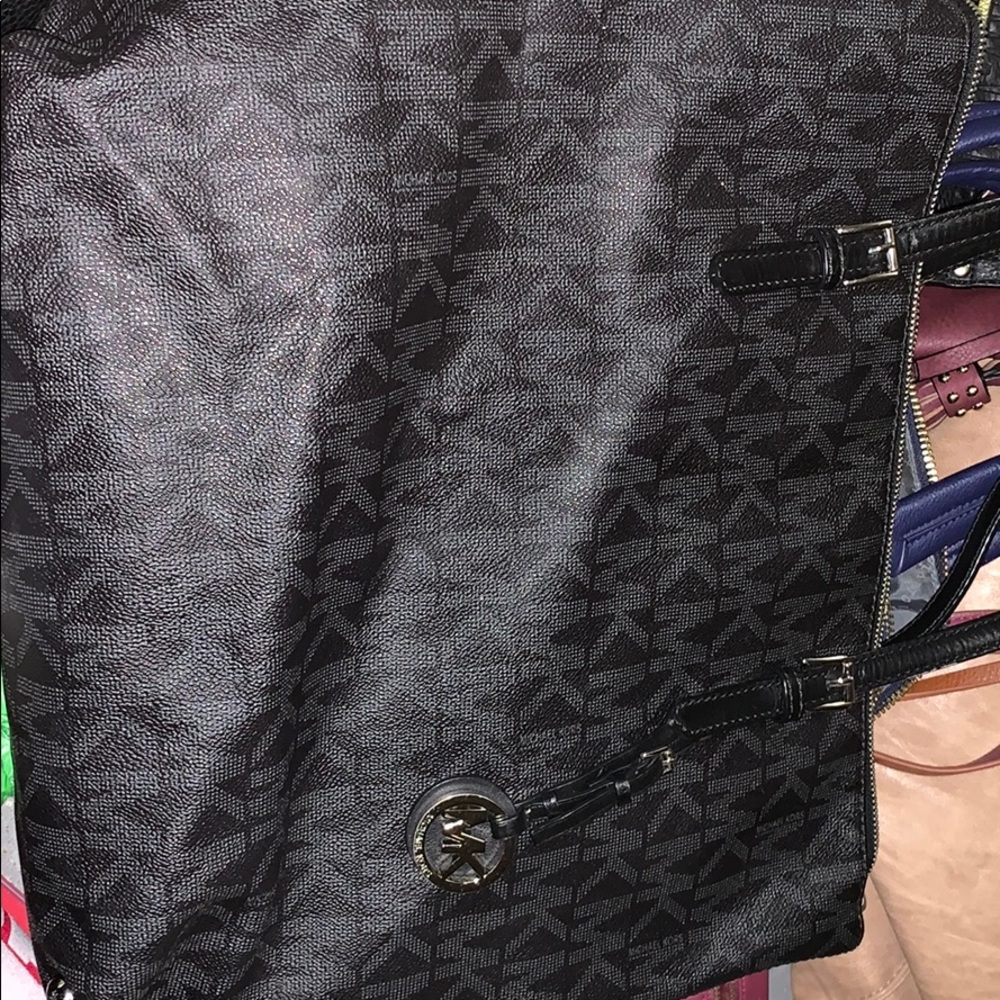 Michael Kors black shoulder purse.